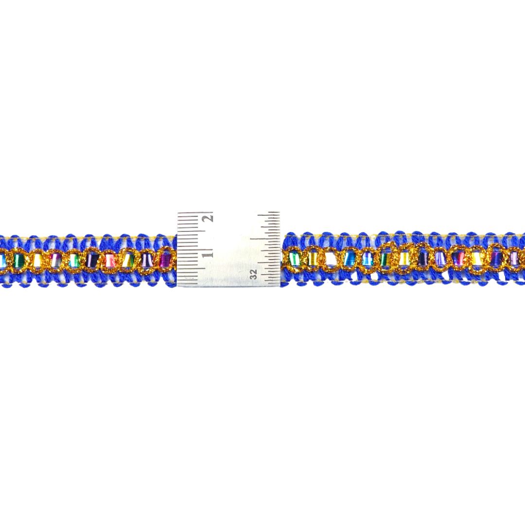 Beaded bracelet with a ruler for size reference on a white background